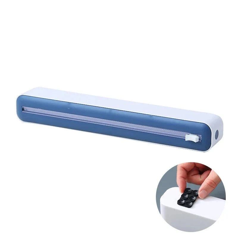 Versatile magnetic kitchen wrap dispenser with slide cutter for managing cling film, foil, and baking paper in a Kiwi kitchen