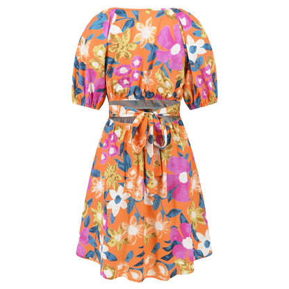 Floral print Y2K summer beach dress with lantern sleeves, v-neck, and stretchy waistline