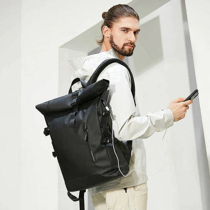 Sleek and weatherproof laptop backpack with adjustable capacity, USB charging, and anti-theft features for the active Kiwi lifestyle