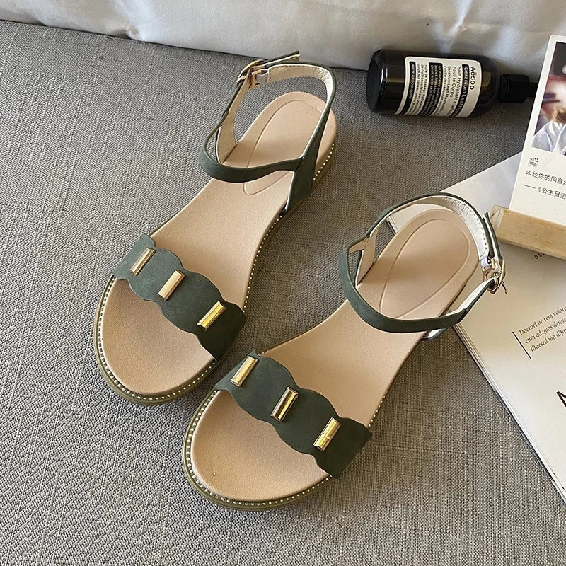 Stylish flat sandals with unique one-word buckle design, available in black, green, and beige colors