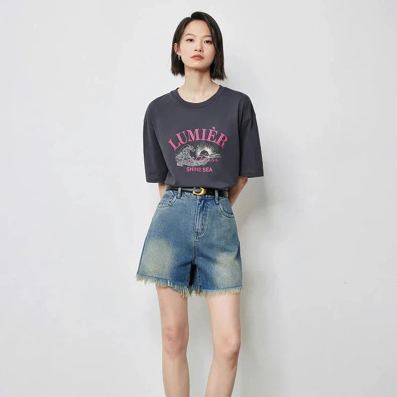 Premium high-waisted denim shorts with playful tassel detailing, perfect for summer outings in New Zealand