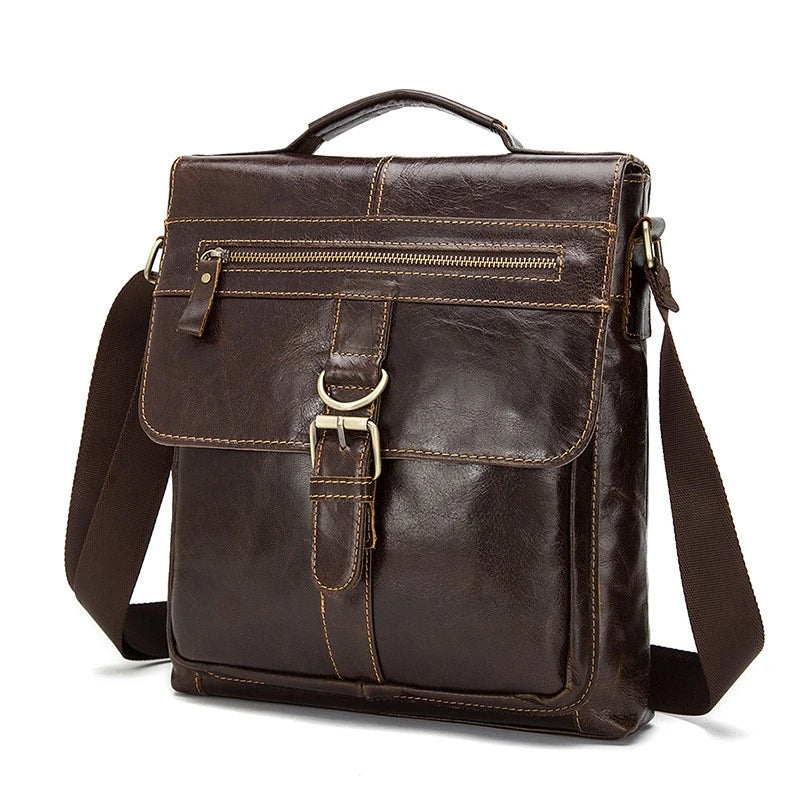 Premium retro-style messenger bag made from durable New Zealand cowhide with versatile interior organization and hands-free single strap design.