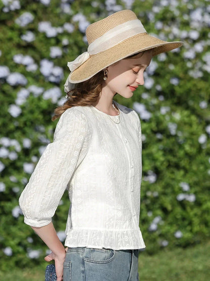 Elegant French-inspired white puff sleeve blouse with tailored fit and timeless design