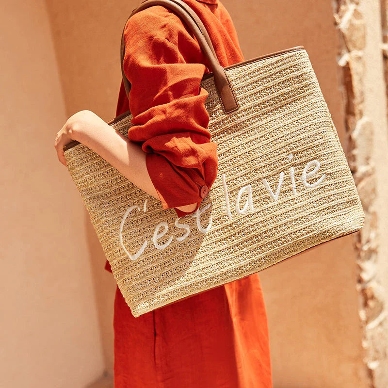 Stylish straw tote bag with trendy letter decoration, perfect for Kiwi women's casual summer style