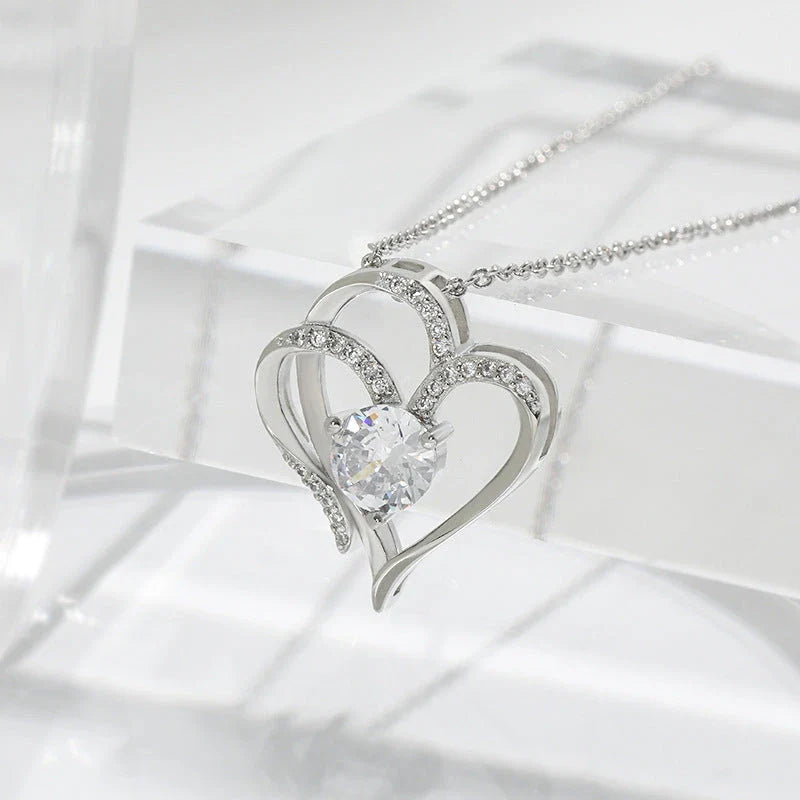 Personalized heart-shaped necklace with sparkling rhinestones, available in white gold or rose gold finishes