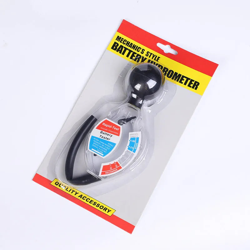 ABS plastic suction electrolyte hydrometer tool for lead-acid battery testing on a workbench.