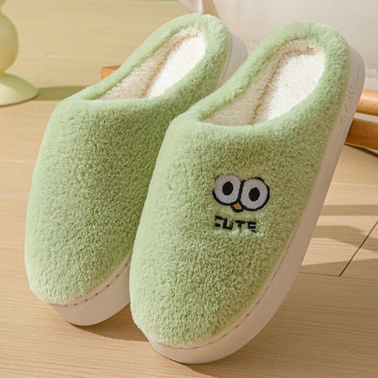 Cozy cartoon slippers with big eyes in various colors, featuring a plush upper and non-slip rubber sole for comfortable indoor wear