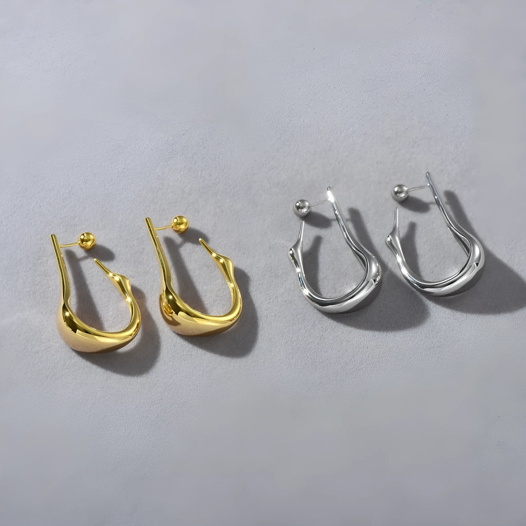 Copper plating 18K real gold irregular lines geometric needle ear studs on white background