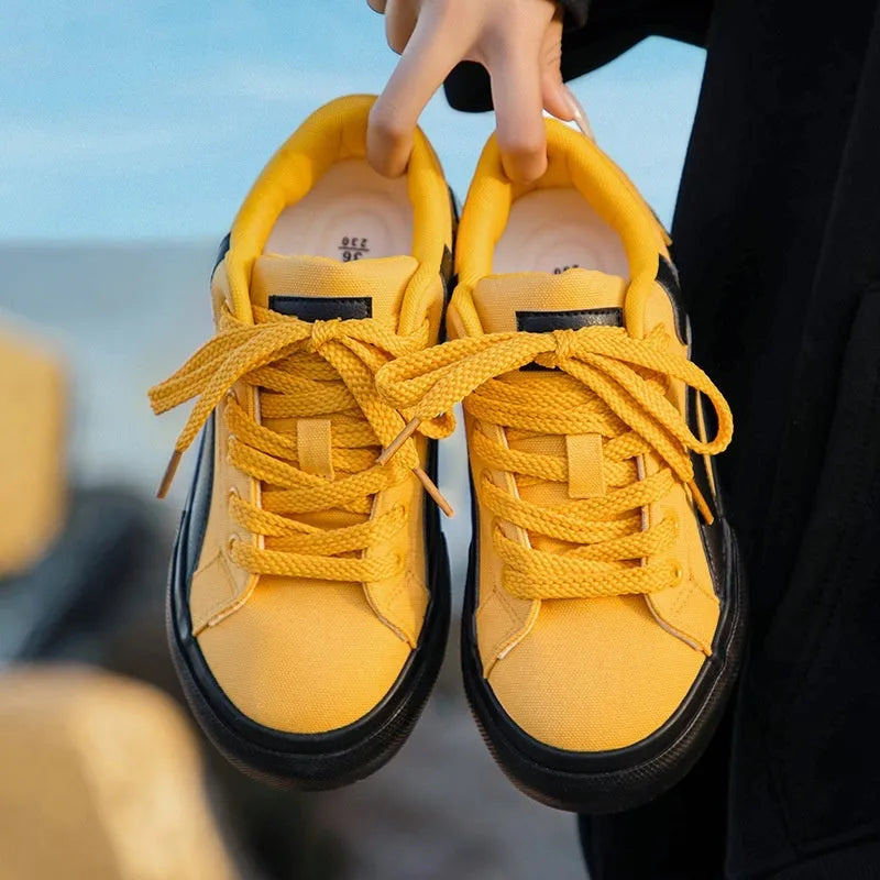 Women's low-top board shoes with vulcanised rubber sole and synthetic leather upper in multiple colour options