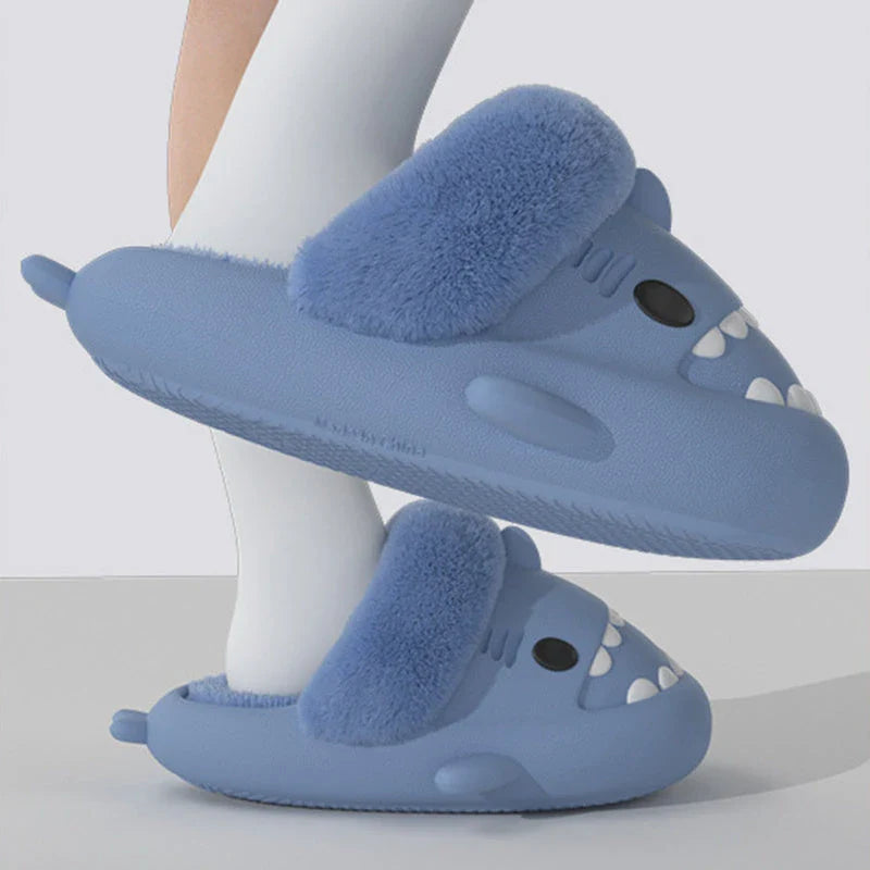 Cozy and stylish shark-themed slippers with plush, fuzzy interior and durable, non-slip outsole for comfortable indoor and outdoor use