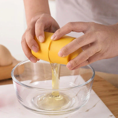 Hassle-Free Egg Cracker and Beater in vibrant colors, featuring a simple press-and-release mechanism for easy egg separation.