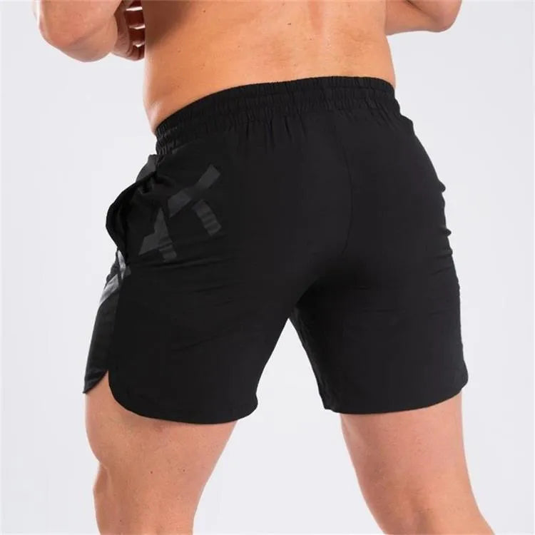 Men's elastic thin training running shorts in quick-drying nylon blend fabric, knee length design in black colour