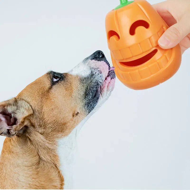 Yellow pumpkin-shaped TPR dog chew toy for aggressive chewers measuring 8.6 x 11.5 cm