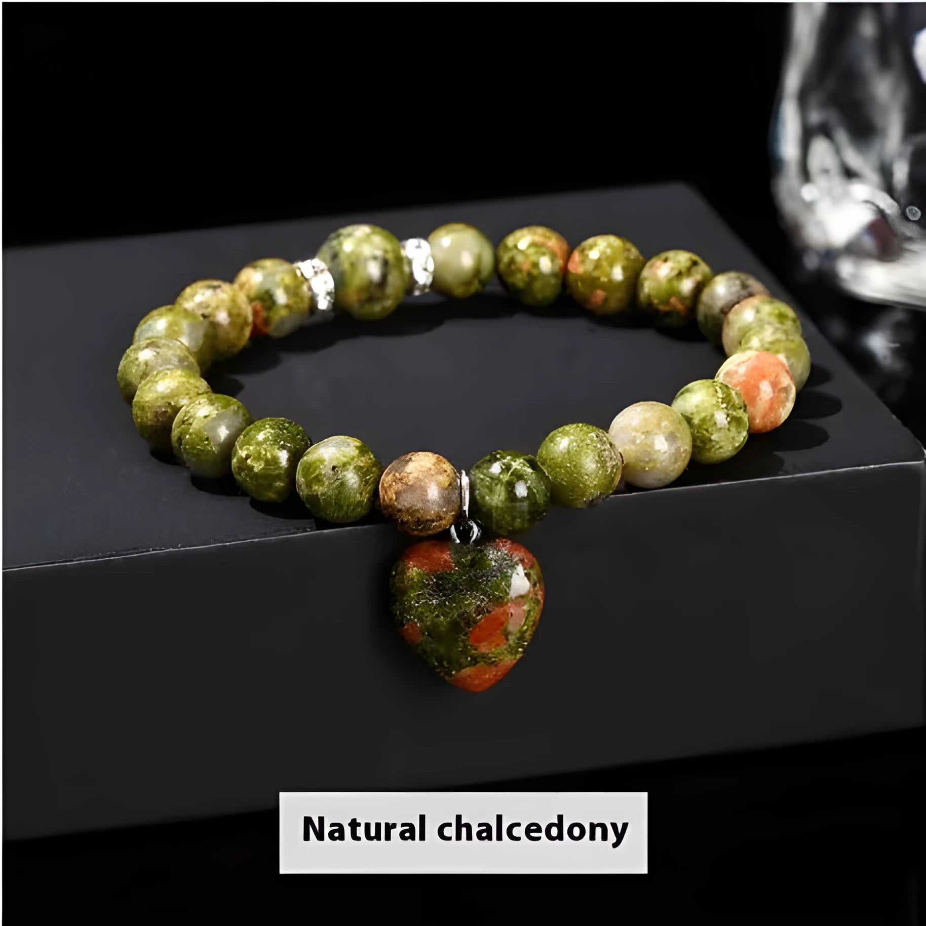 Handmade geometric love pendant bracelet with natural crystal beads in pink, green, white, or yellow.