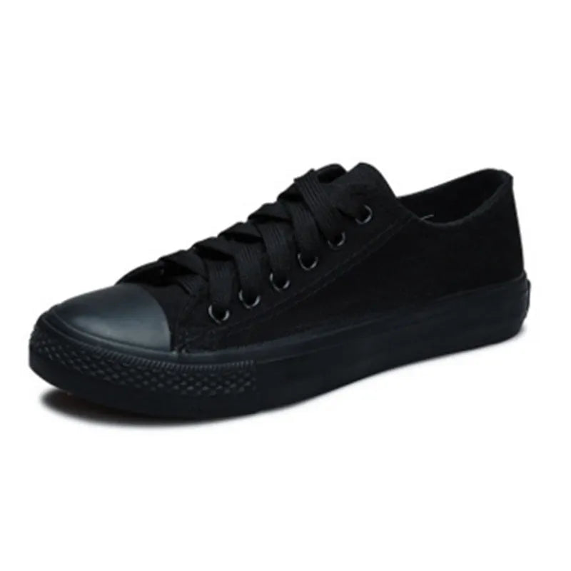 Women's casual canvas shoes in solid colours showing black, white black, white red and all black options