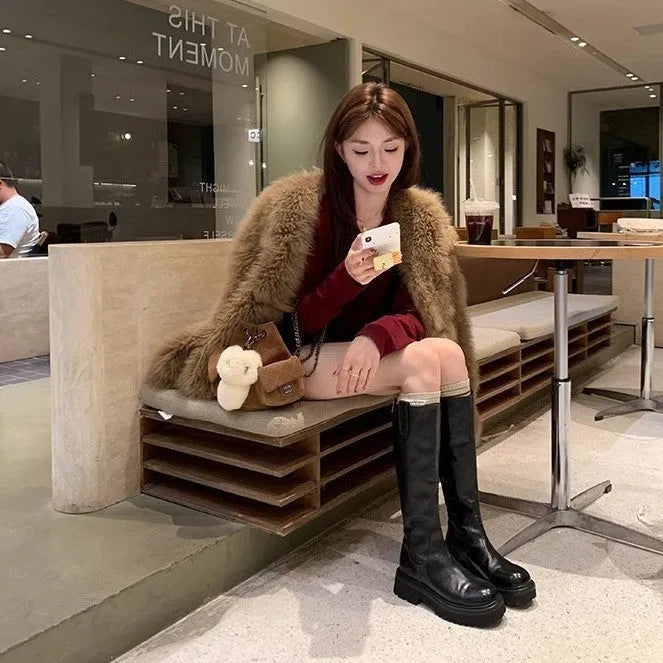 Black round toe knight boots with chunky heel, high tube design, and a back zipper.
