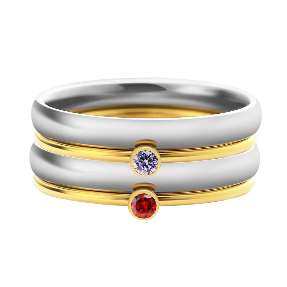 Geometric engraved titanium steel ring with December birthstone colour accents showing superimposed combination design