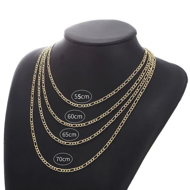 Men's simple electroplated alloy necklace in gold on a grey background