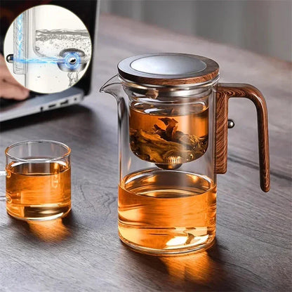 Innovative glass teapot with magnetic separation technology, wooden handle, and clear design for brewing and serving tea