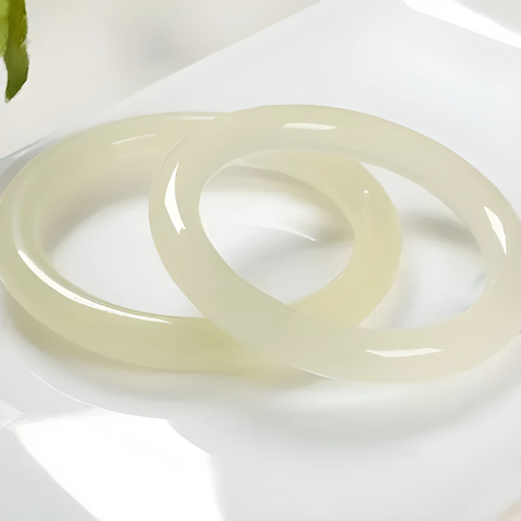 Jade round bar bracelet with winding design showing six sizing options
