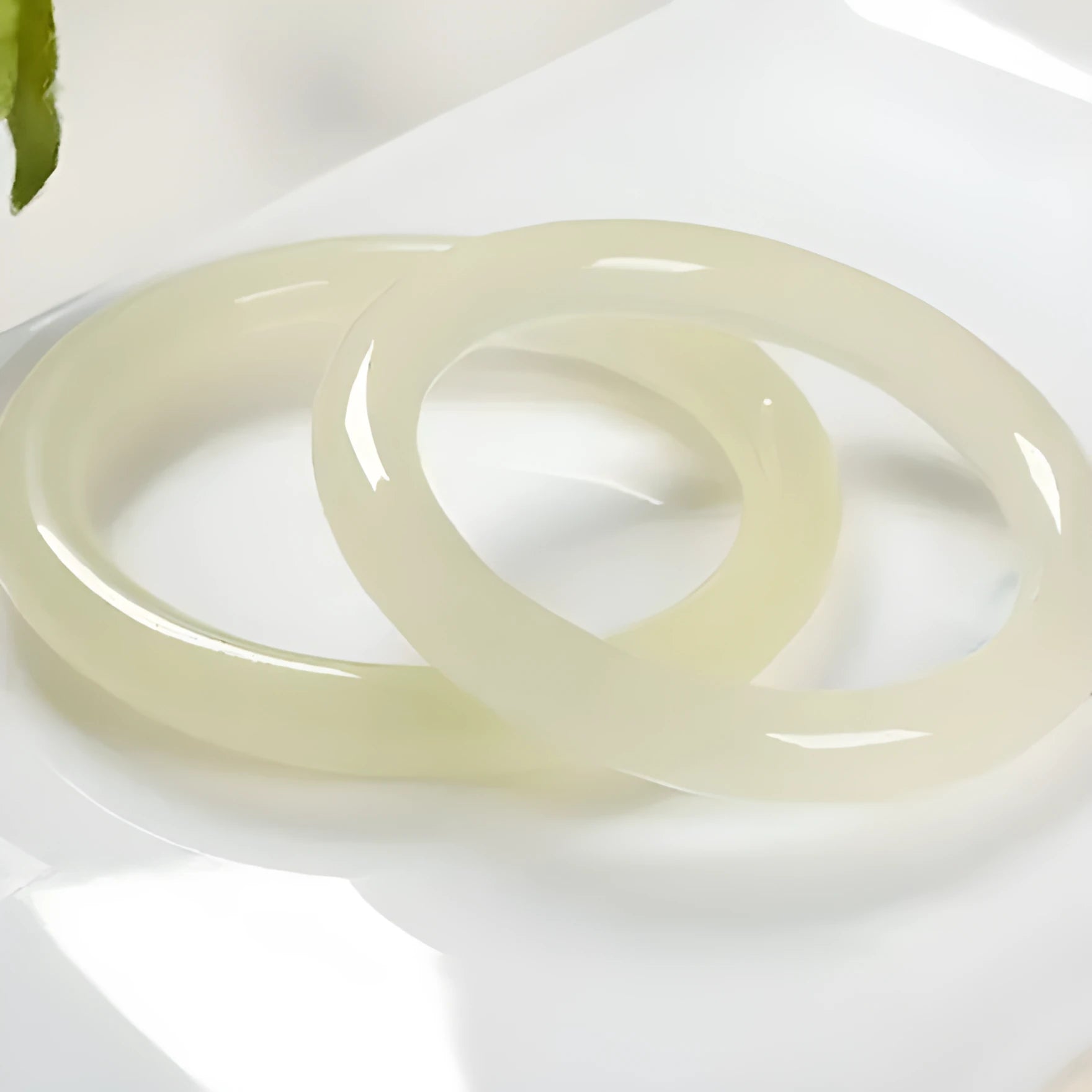 Jade round bar bracelet with winding design showing six sizing options