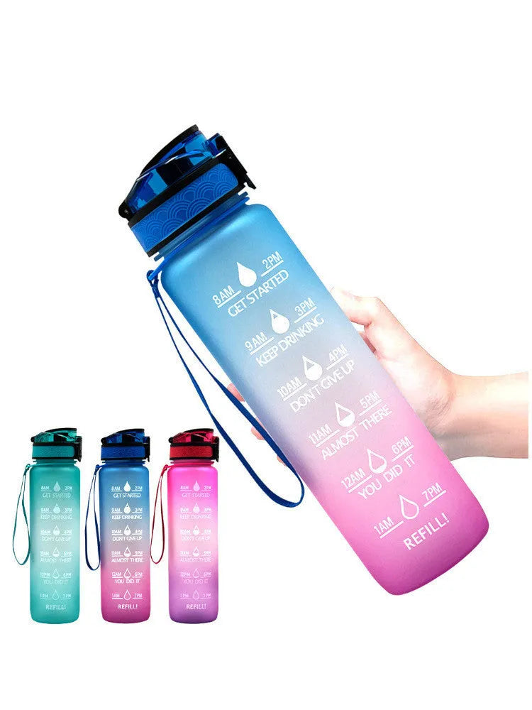 Clear transparent 1000ml sports water bottle with blue lid and removable fruit infuser inside.