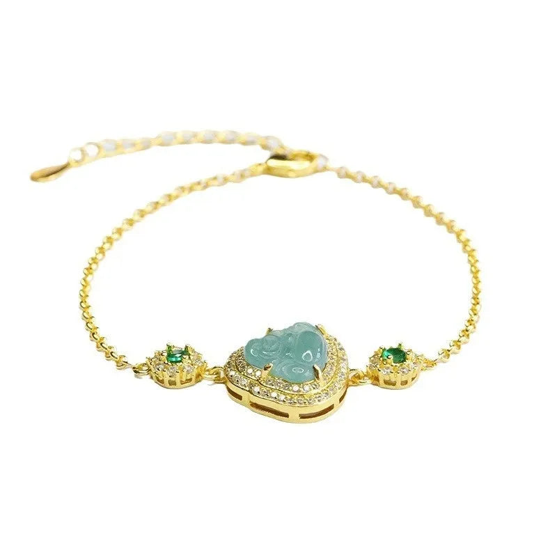 Jade bracelet with inlaid Maitreya Buddha carving in emerald blue water colour