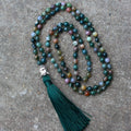 Indian agate bracelet with 108 geometrically shaped 6mm beads on wrist