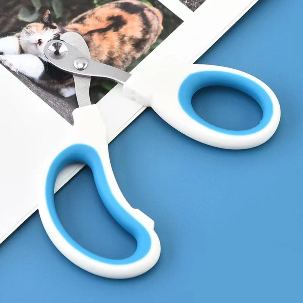 Blue cat nail clippers with circular cut hole and cushioned non-slip handles for safe pet grooming