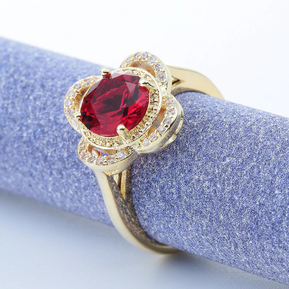 Copper zircon fruit-shaped ring with electroplated finish shown in size options