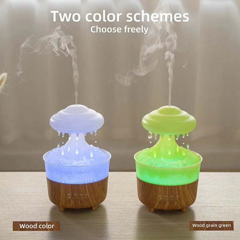 Wood grain white rain cloud shaped humidifier, diffuser, and night light on a table.
