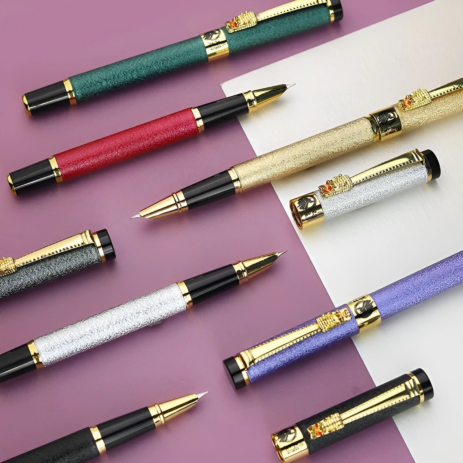 Metal fine art fountain pen with iridium nib, shown in multiple colour options including black, gold, and silver.