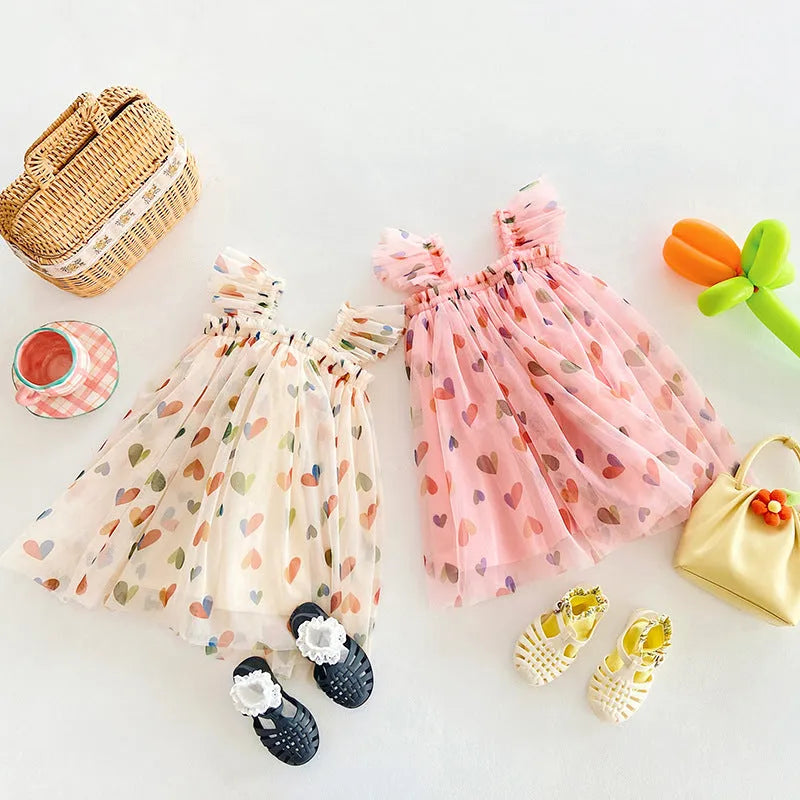 Girls summer dress with heart print mesh outer and cotton lining, pink or apricot, sizes 80cm to 130cm