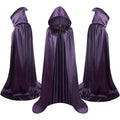 Reversible black satin hooded cloak for Halloween costume displayed flat.