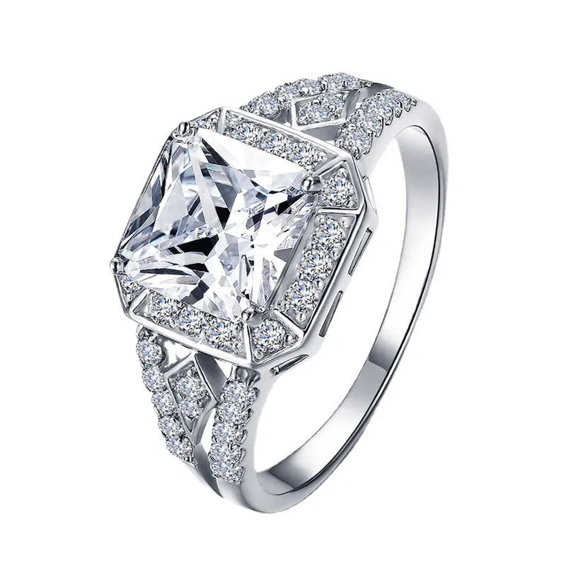 Geometric hollow zircon ring in platinum colour with quadrilateral design on copper band