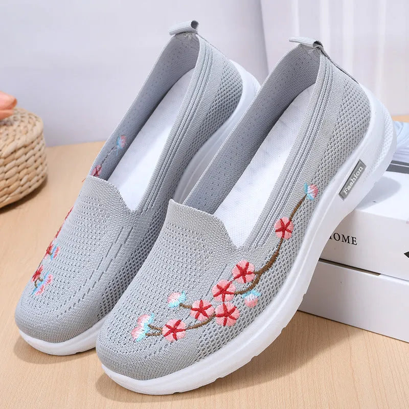 Women's embroidered woven casual pump in wine red with a low heel and anti-slip sole.