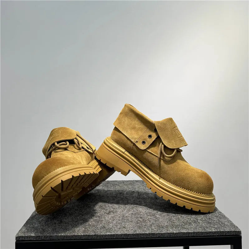 Retro distressed thick-soled suede boots with buckle closure in camel colour.