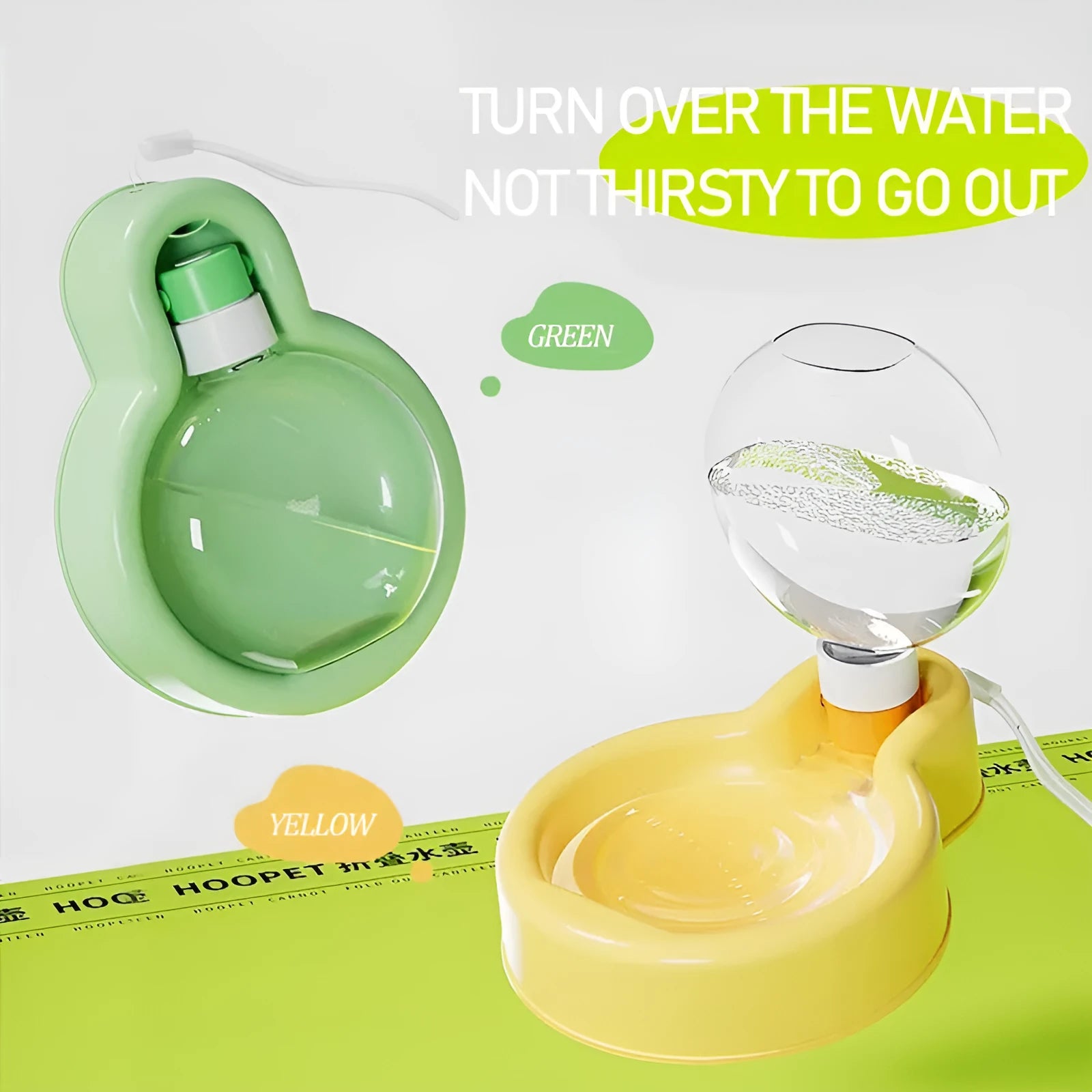 Green portable dog water bottle with pull-out drinking bowl on a table
