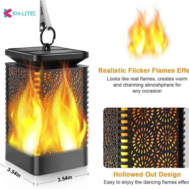 Four black solar-powered hanging torch lights with flame-effect LEDs for outdoor garden decoration.