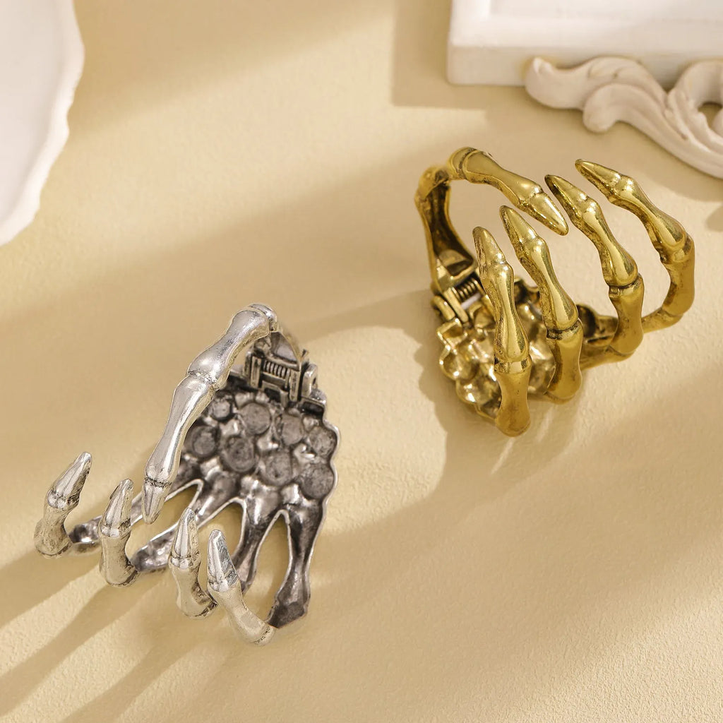Retro hollow skull paw bracelet for women in antique bronze finish