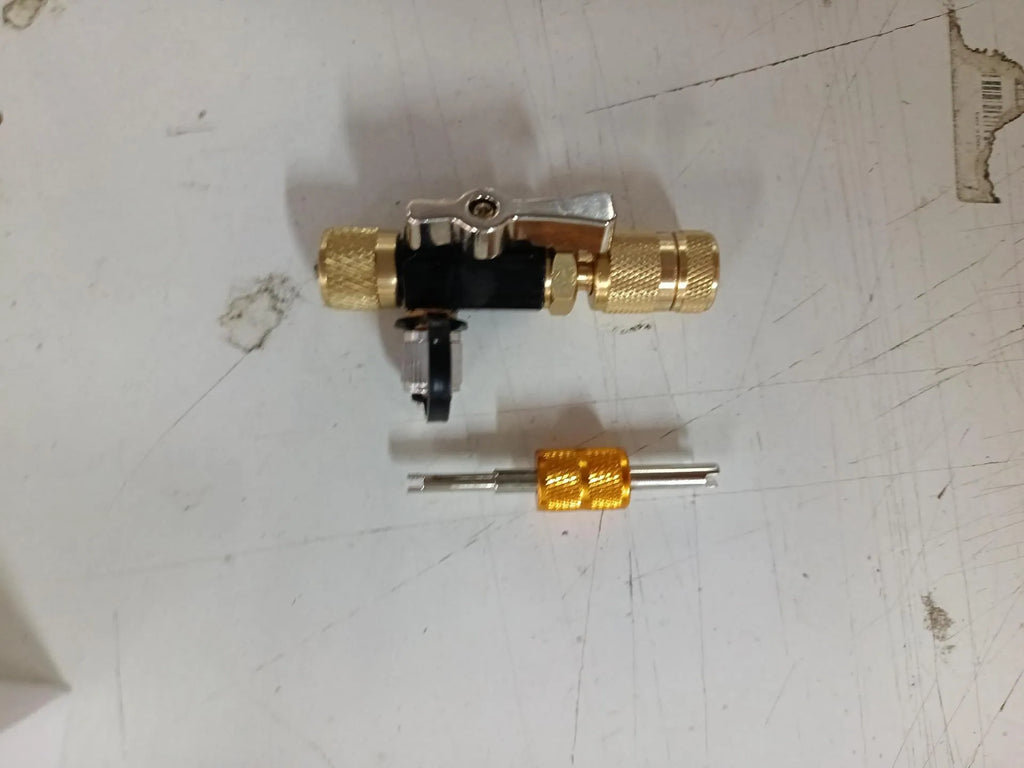 Vacuum valve core disassembly tool set with metal valve removers in black and pink colours