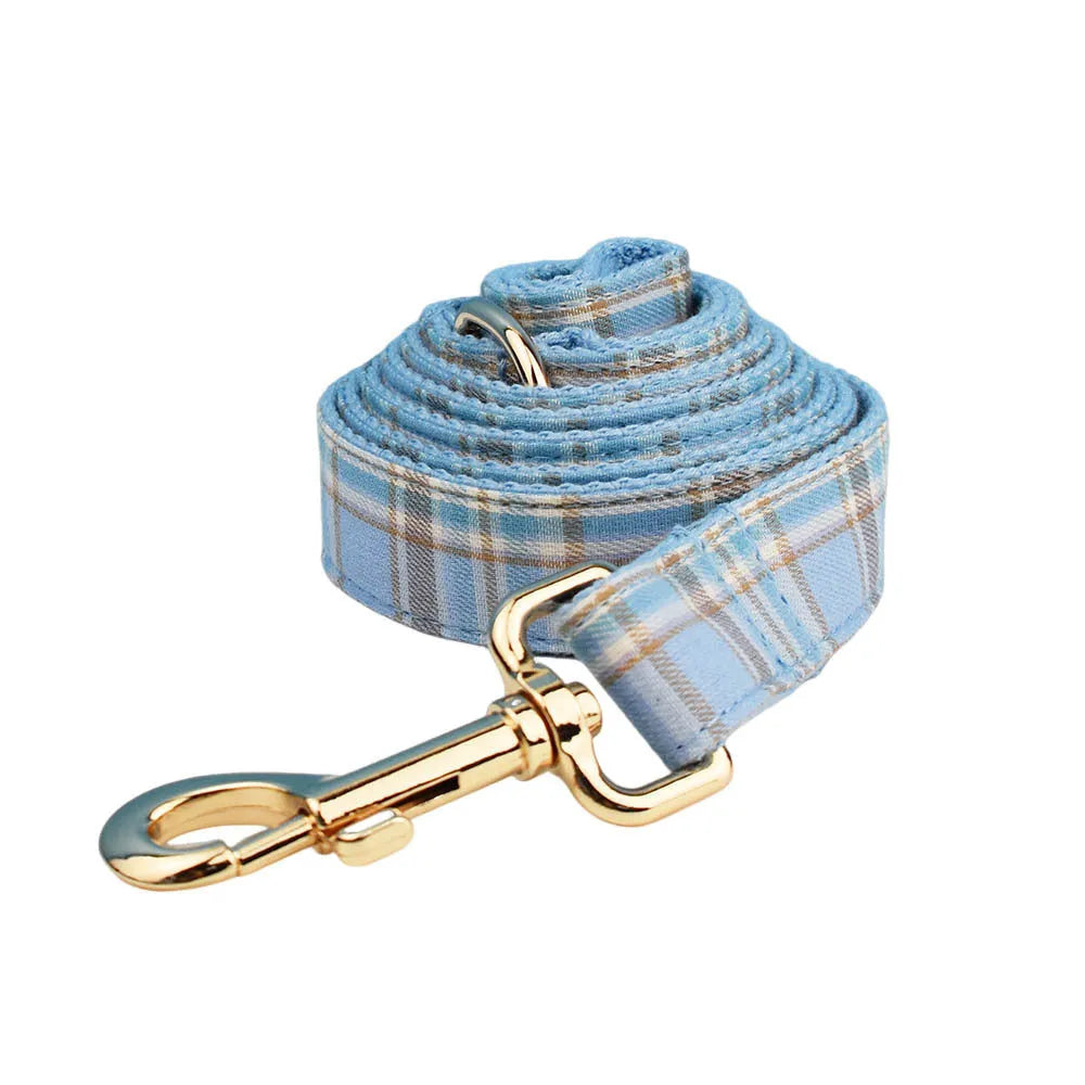 Sky blue grid forest pattern dog collar set with leash, bow, and vest for special occasions