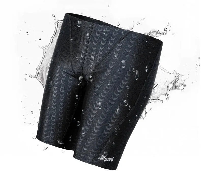 Men's solid colour shark skin texture waterproof swimming trunks for surfing, shown in sizes XL to 4XL.
