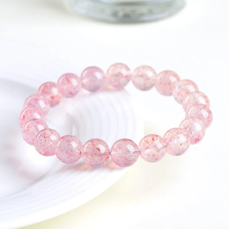 Natural white water strawberry quartz crystal bracelet with 10–10.8mm round beads.