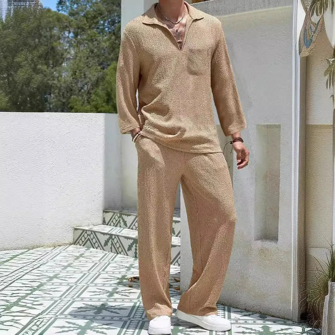 Man wearing a lake blue casual shirt and trouser suit set for autumn leisure.