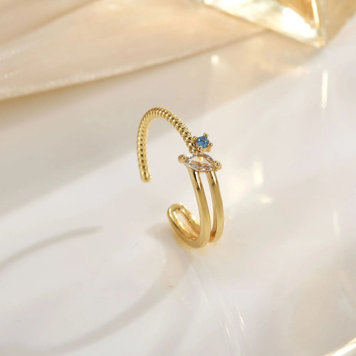 Adjustable irregular geometric ring in gold or silver electroplated copper with line detailing