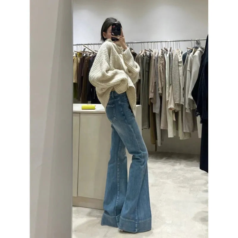 High waist flared jeans in cotton denim with loose design, shown in blue colour option