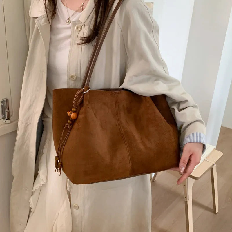 Large capacity suede tote bag in horizontal square shape with single shoulder strap, available in green with matching pendant