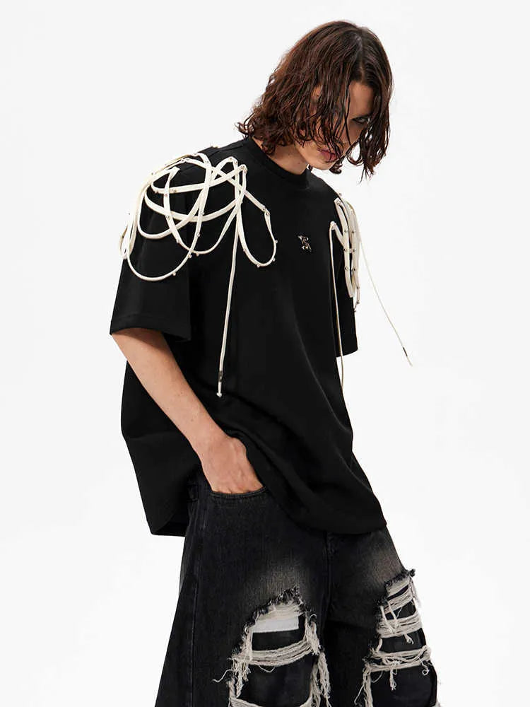 Black loose fit T-shirt with rivet ribbon padded shoulders and short sleeves