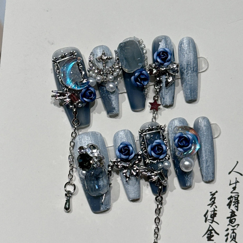 Evening manicure set with rose and tulip patterns in night blue colour featuring plastic armour suit